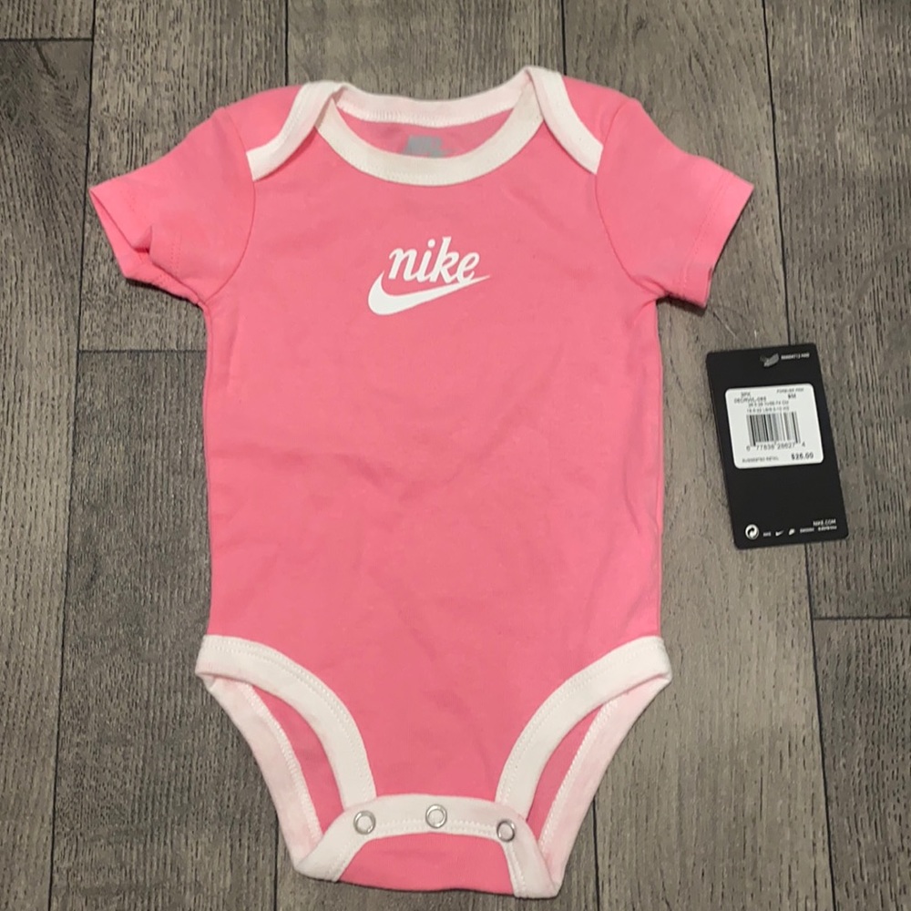 Pink Nike onesie